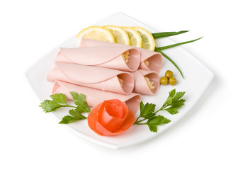 Rolls from sausage and cheese with vegetables