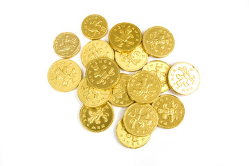 Chocolate money isolated on white studio background.