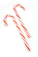 Candy canes isolated on a white studio background.