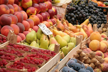 Variety of fresh fruit at the market. Pears, peaches, plums