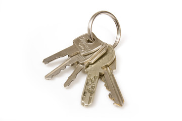 Bunch of house keys isolated on a white studio background.