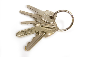 Bunch of house keys isolated on a white studio background.