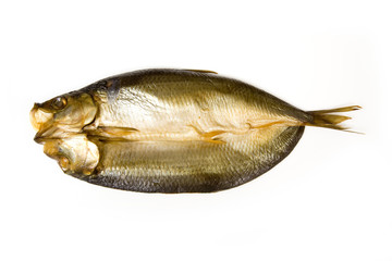 Smoked kipper isolated on a white studio background.