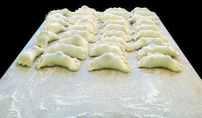 vareniks with cherry are Ukrainian foods  closeup..