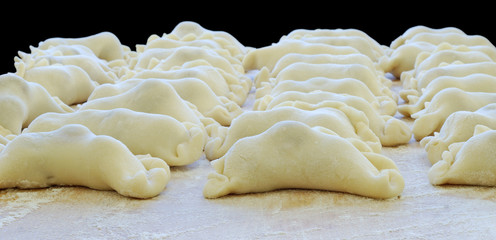 vareniks with cherry are Ukrainian foods  closeup..