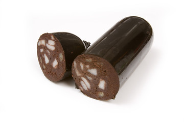 Black pudding sausage isolated on a white studio background.