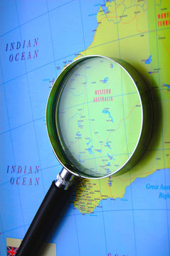 Travel Destination. Magnifying glass on map