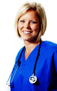 Mature Nurse In Blue Scrubs With Stethoscope.