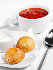 Meat Borscht Served with Pampushka (bread) and Sour Cream
