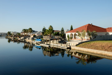 Houses waterside on Padre Island, southern Texas USA