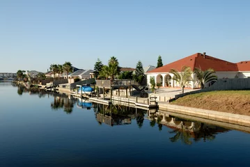 Zelfklevend Fotobehang Houses waterside on Padre Island, southern Texas USA © philipus
