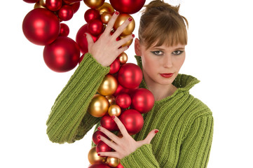Fototapeta na wymiar Fashion model holding bunch of Christmas balls