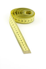 tape measure isolated on white background with shallow DOF