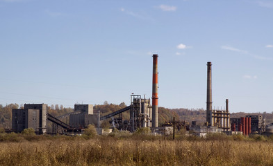 Fototapeta na wymiar dirty coal industry and blue sky