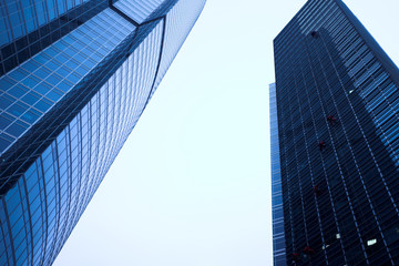Fototapeta na wymiar New skyscrapers business centre, climbers clean windows