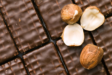 Background of chocolate cookies with nuts