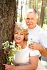 Smiling happy  elderly couple in love outdoor .