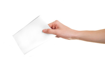 Hand with ballot on white background.