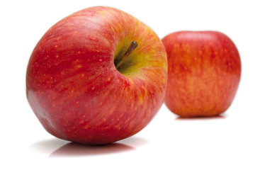 The red apples on white. Isolation, shallow DOF.