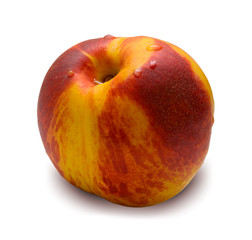 Red peach covered by drops of water. Isolated on the white