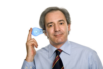 silly business man with a lamp isolated on white