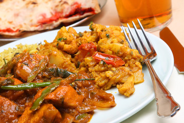 Chicken jalfrezi with vegetable curry, rice and keema naan