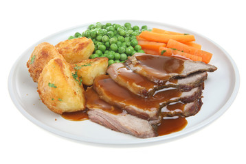 Roast dinner with lamb, potatoes and vegetables