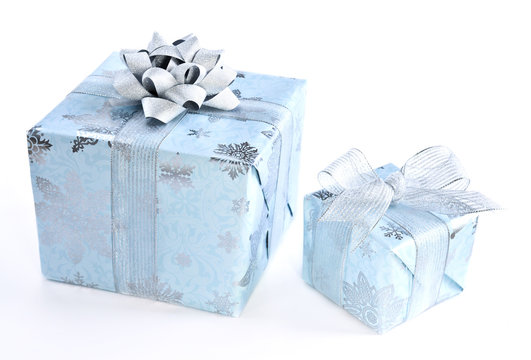 Two wrapped christmas gift boxes isolated on white background