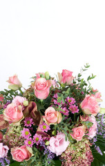 Mixed flowers arrangement with white copyspace