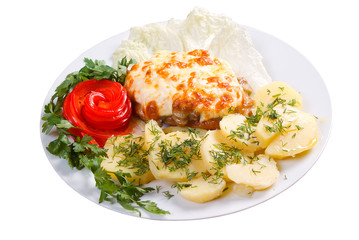 meat with potatoes and vegetable.isolated on white background
