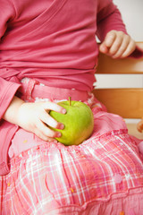 child with apple