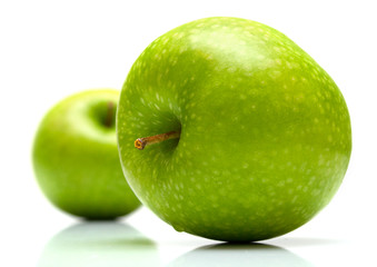 Green apples on the white background. Isolated.