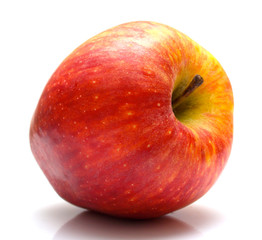The ripe juicy red apple. Isolation on white.