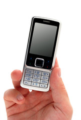 A hand hold mobile phone. The screen is cut with clipping path