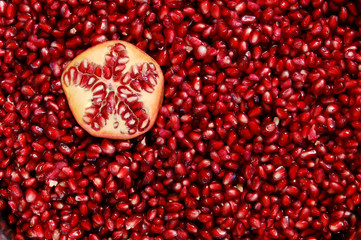 A bowl of freshly cleaned red pomegranate seeds