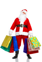 Shopping Christmas Santa. Isolated over white background.