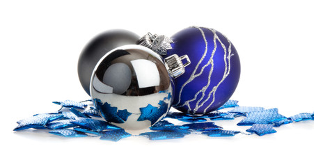 Christmas balls lying on blue stars, isolated