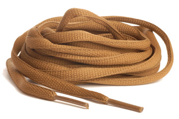 brown or tan shoelaces isolated on a white background