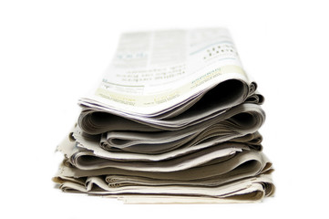 Stack of newspaper in isolated white background