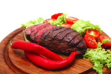 roasted beef meat steak and vegetables