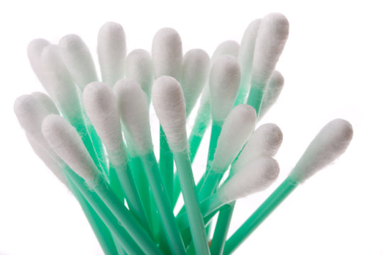 detail of  cotton swabs on white background