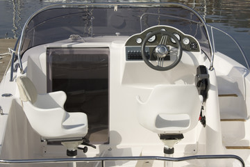 Motor boat cockpit with wheel and instruments