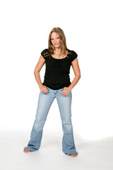 attractive young woman wearing very long blue jeans