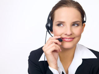 Portrait of beautiful and young business woman with headphones