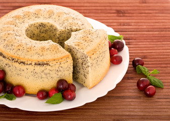 Poppy seed cake on isolated white