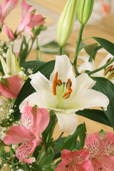 Bouquet from lilies of white and pink color.