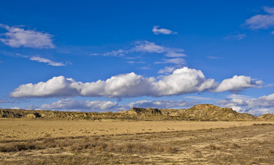 Hill under the cloudy sky in spring season