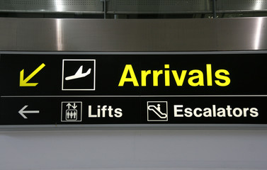 Arrivals, lifts and escalators signs at Dublin Airport