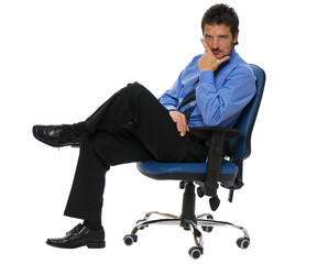 young confident business man sitting in a chair