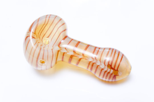 Glass pipe isolated on a white studio background